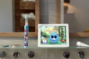 Phillips Sonicare for Kids toothbrush with app shown on tablet