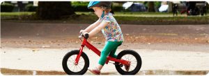 child on Balance Bike