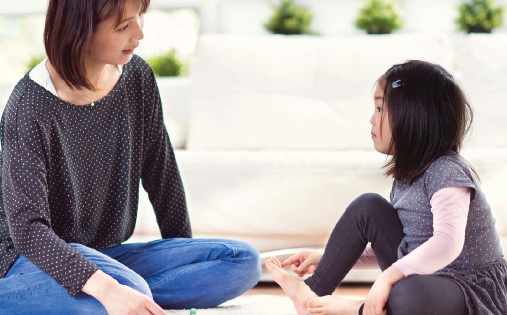 Mother talking to daughter about Post-Secondary
