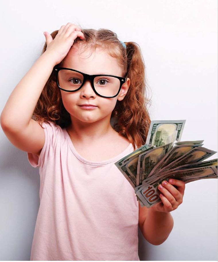 child holding money