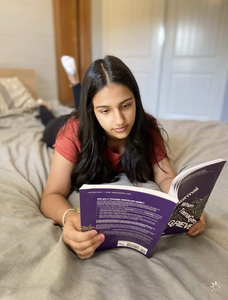 teenager reading about grief