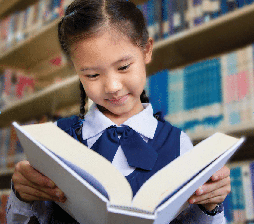 girl with book in uniform