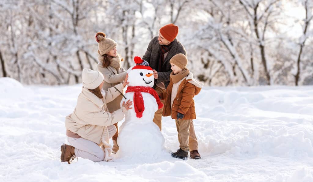 family building snowman during winter break, advent calendar activities