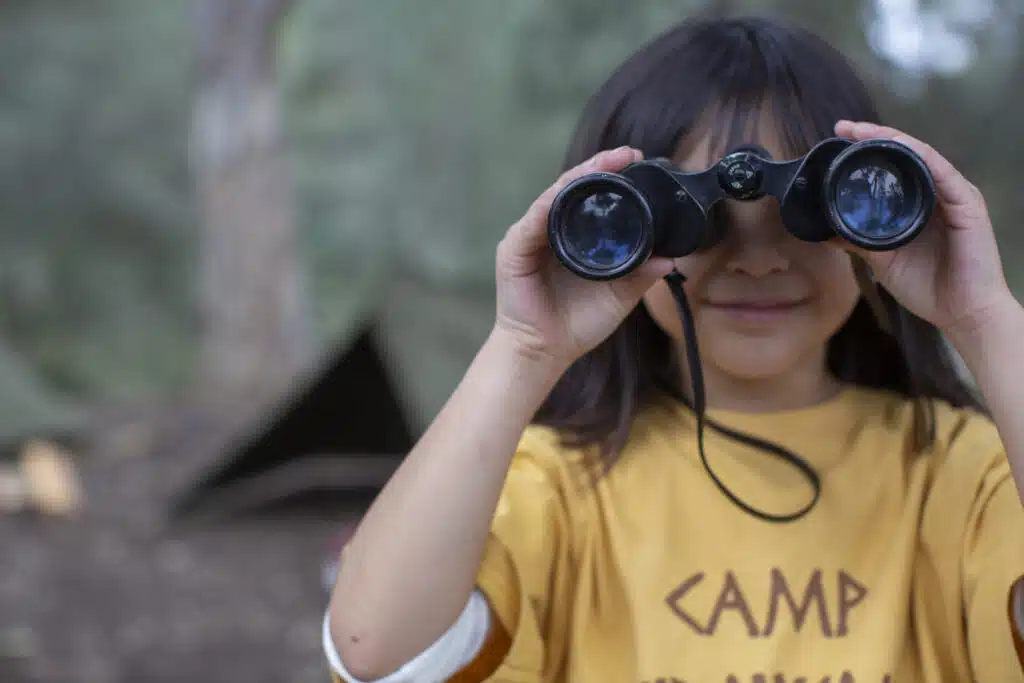 summer-camps girl with binoculars