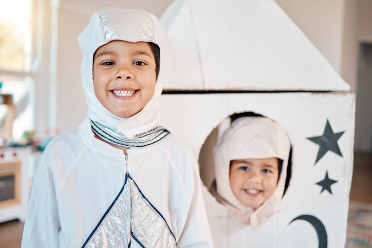 children dressed up for a Space theme birthday party.