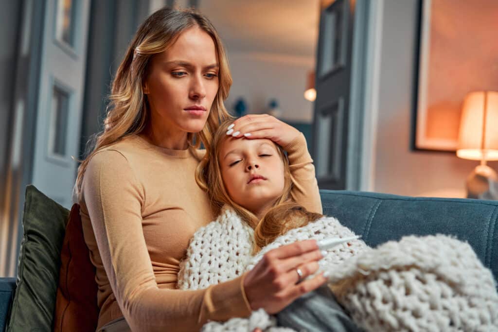 Mother and sick child orange