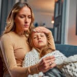 Mother and sick child orange