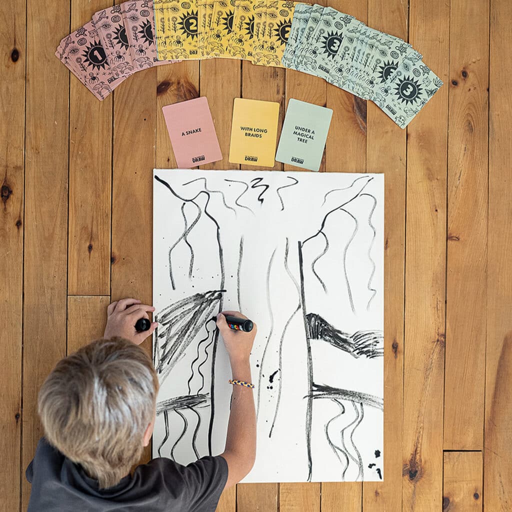 child colouring during the rain