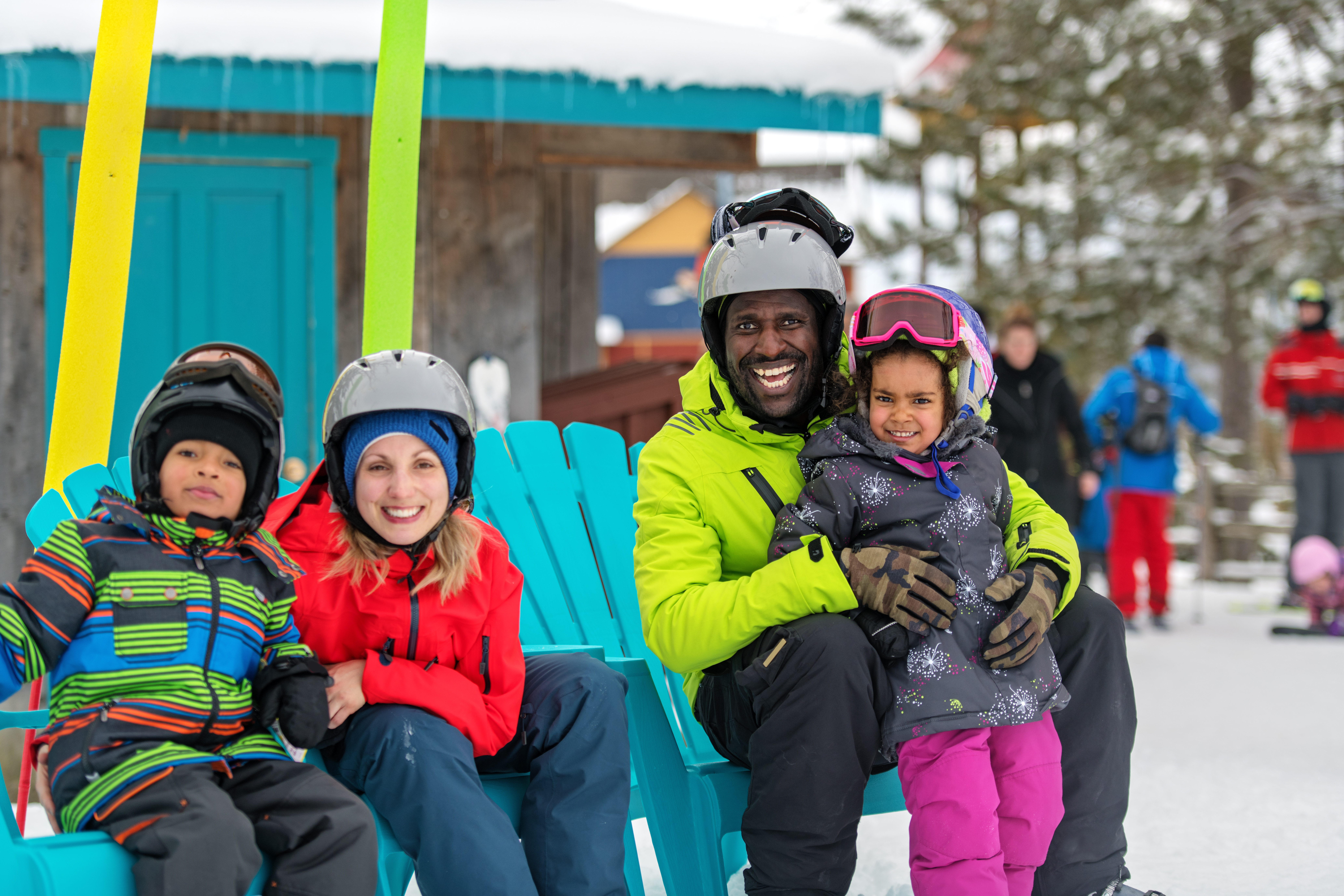 family enjoying snow activities