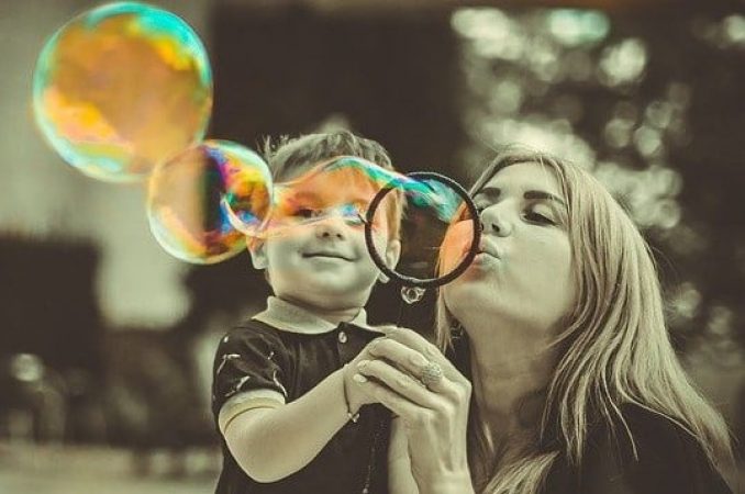 mother-and-son-blowing-bubbles-small